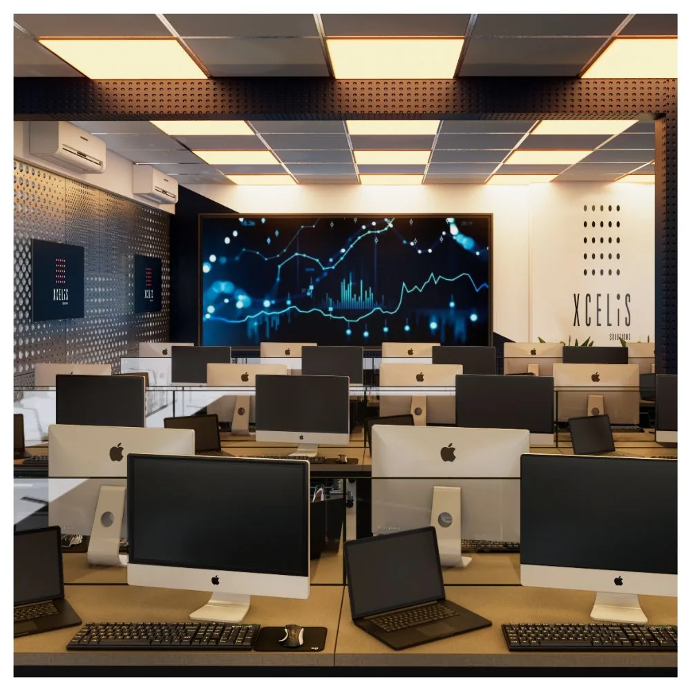 Ambiente corporativo com estações de trabalho e iluminação no teto
